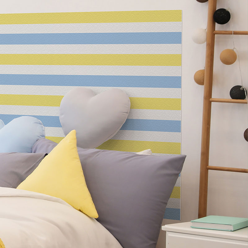 Detalle cabecero de cama de vinilo infantil Rayado Azul y Amarillo