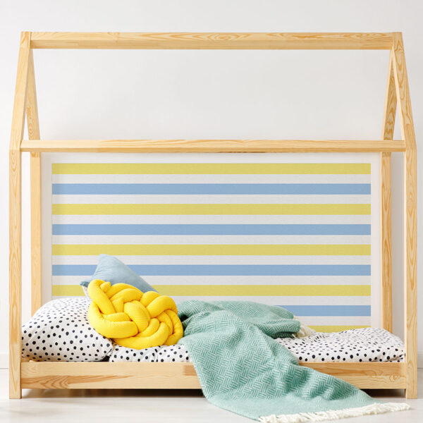 Cabecero de cama de vinilo Infantil Rayado Azul y Amarillo detalle cama