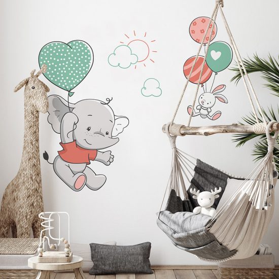 Vinilos decorativos infantiles Elefante volador dormitorio infantil